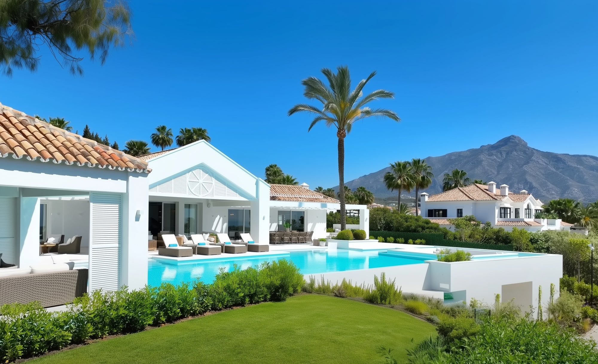 Andalusian-style facade with tiled roof and white walls