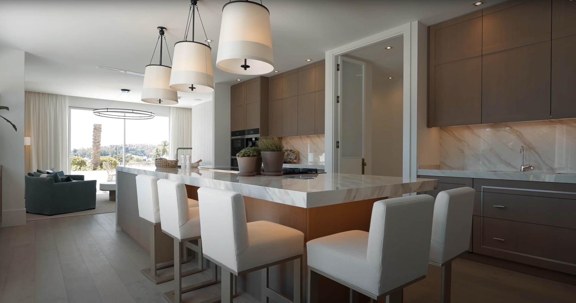 Master suite with direct pool access and garden view