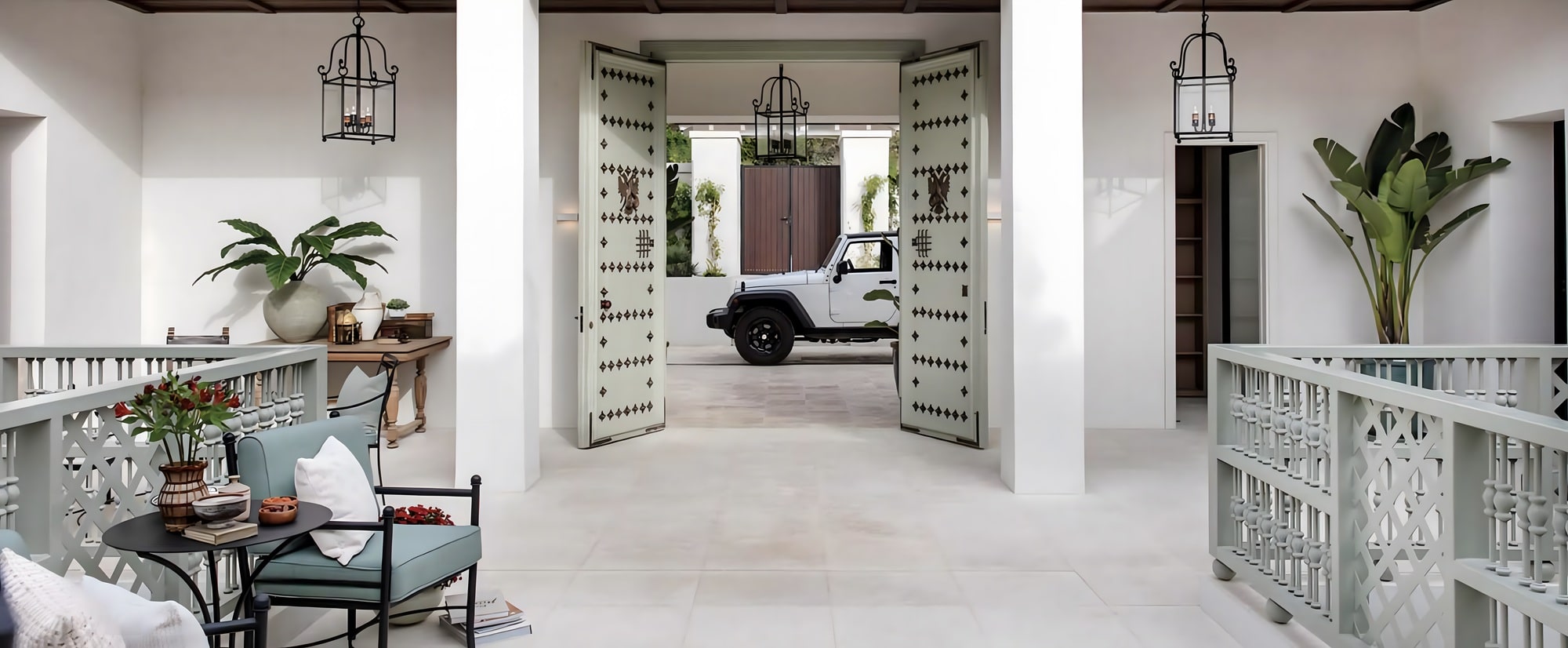 Porch dining area with pergola and open kitchen