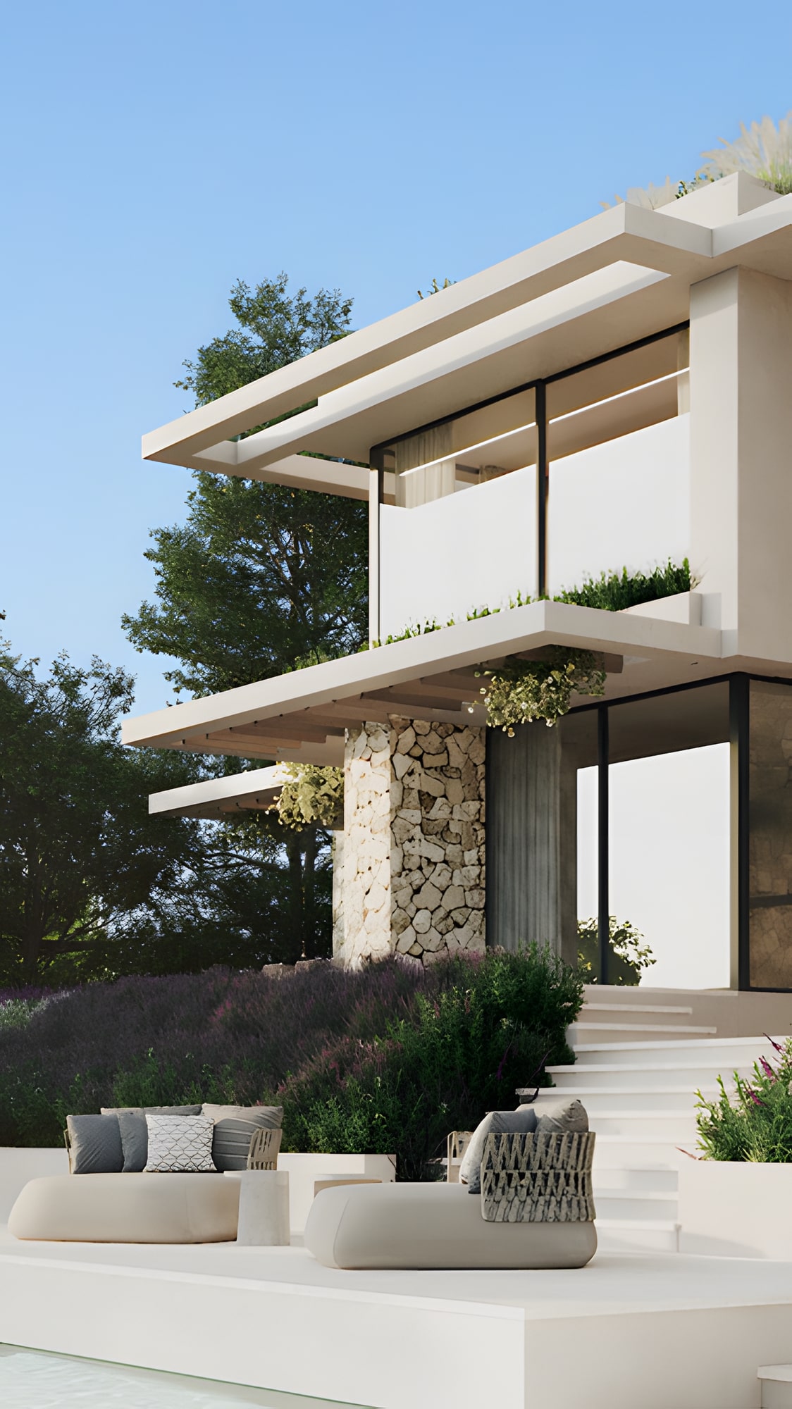 Interior lounge opening onto shaded patio and landscape