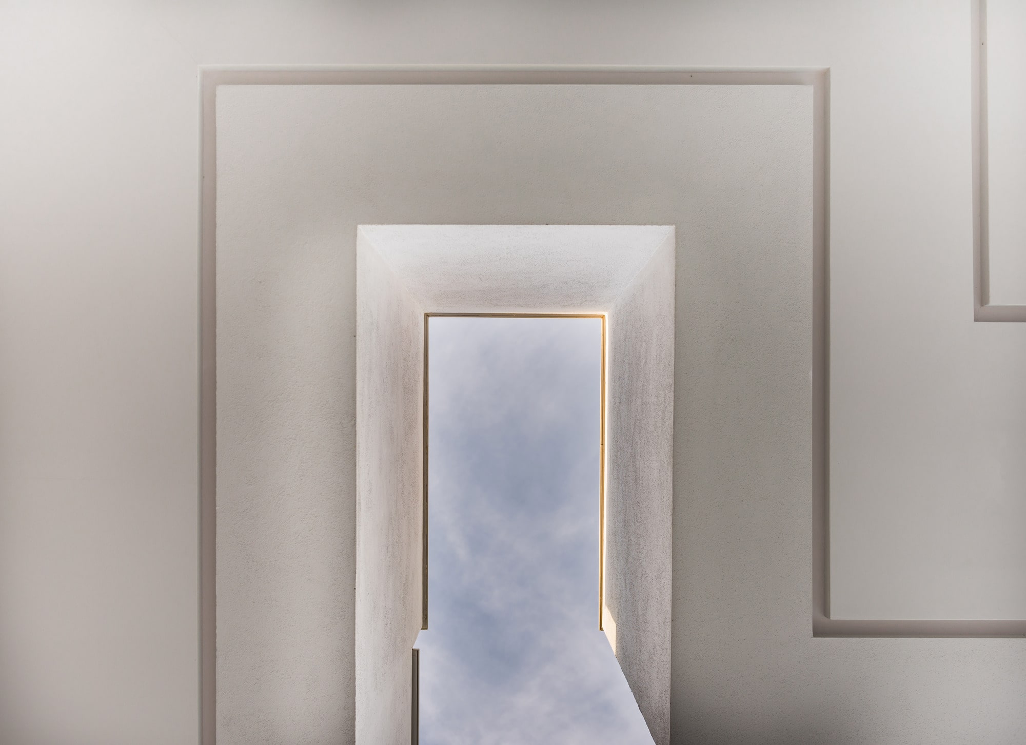 Interior view showing continuity of floor from indoor to terrace