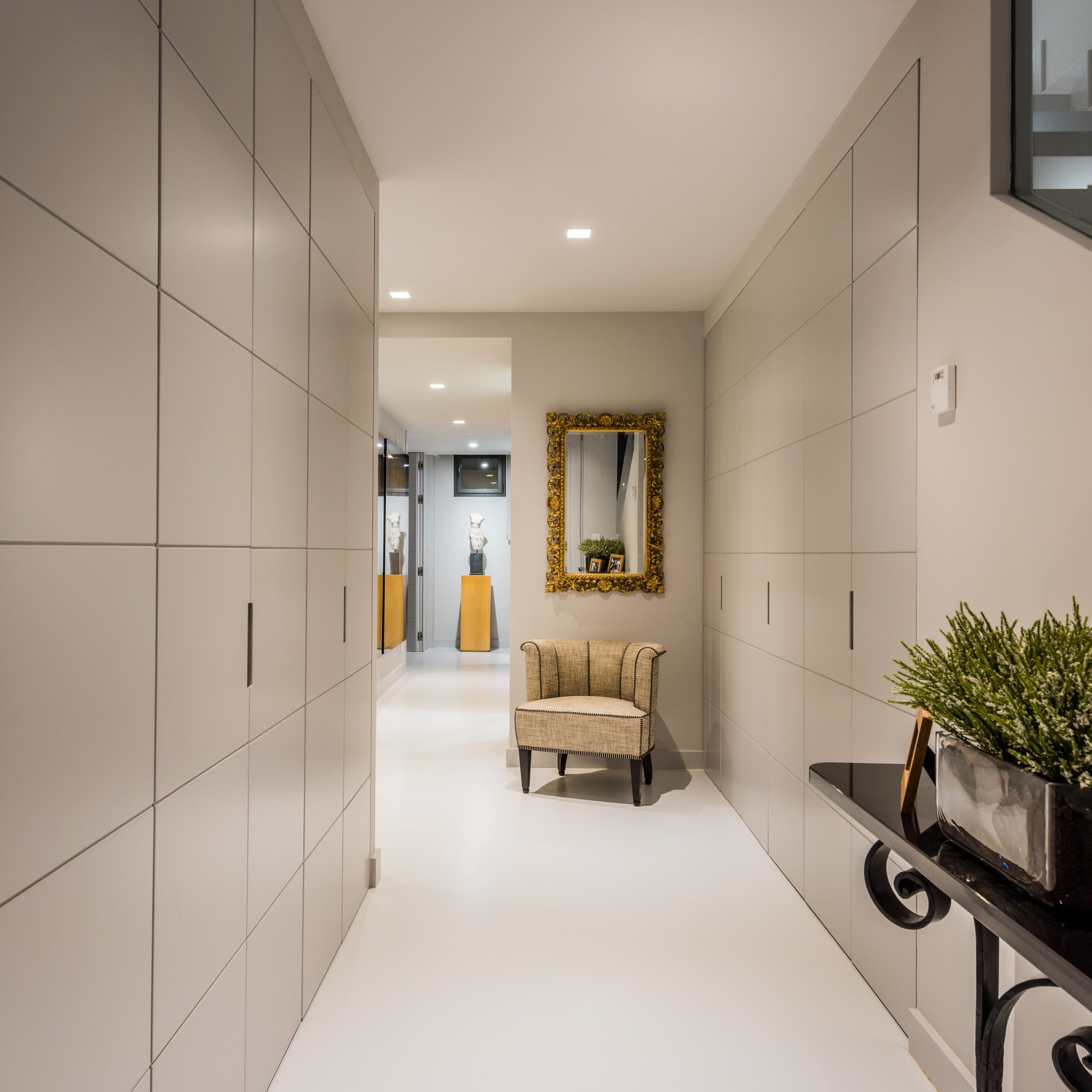 Architectural corner with integrated planters and lighting