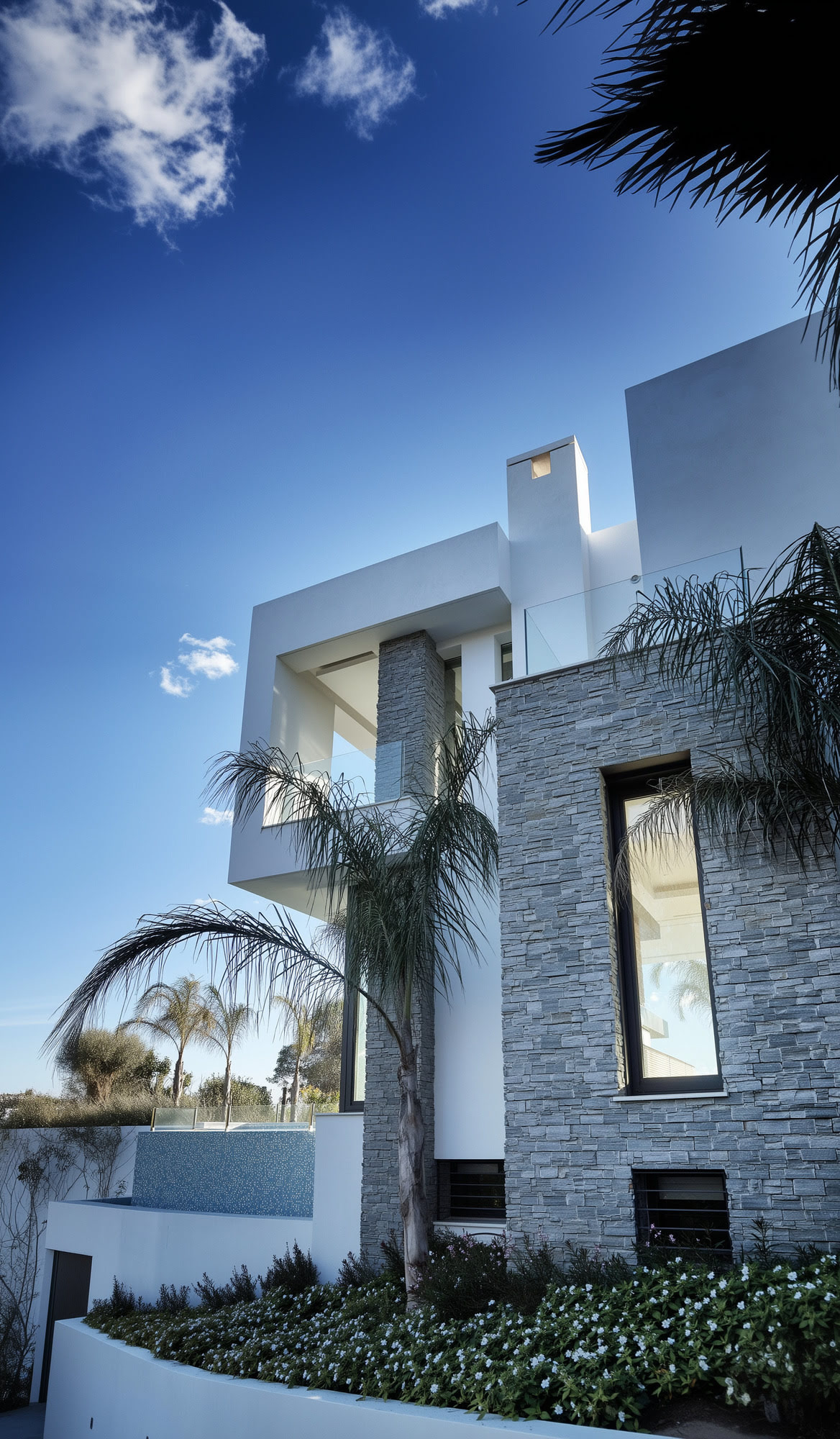 CASALINA – geometric white villa reflecting in the pool at dusk