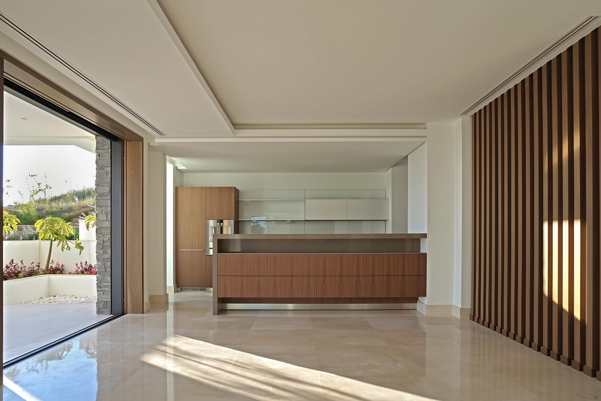 Bathroom with seamless finishes and integrated lighting