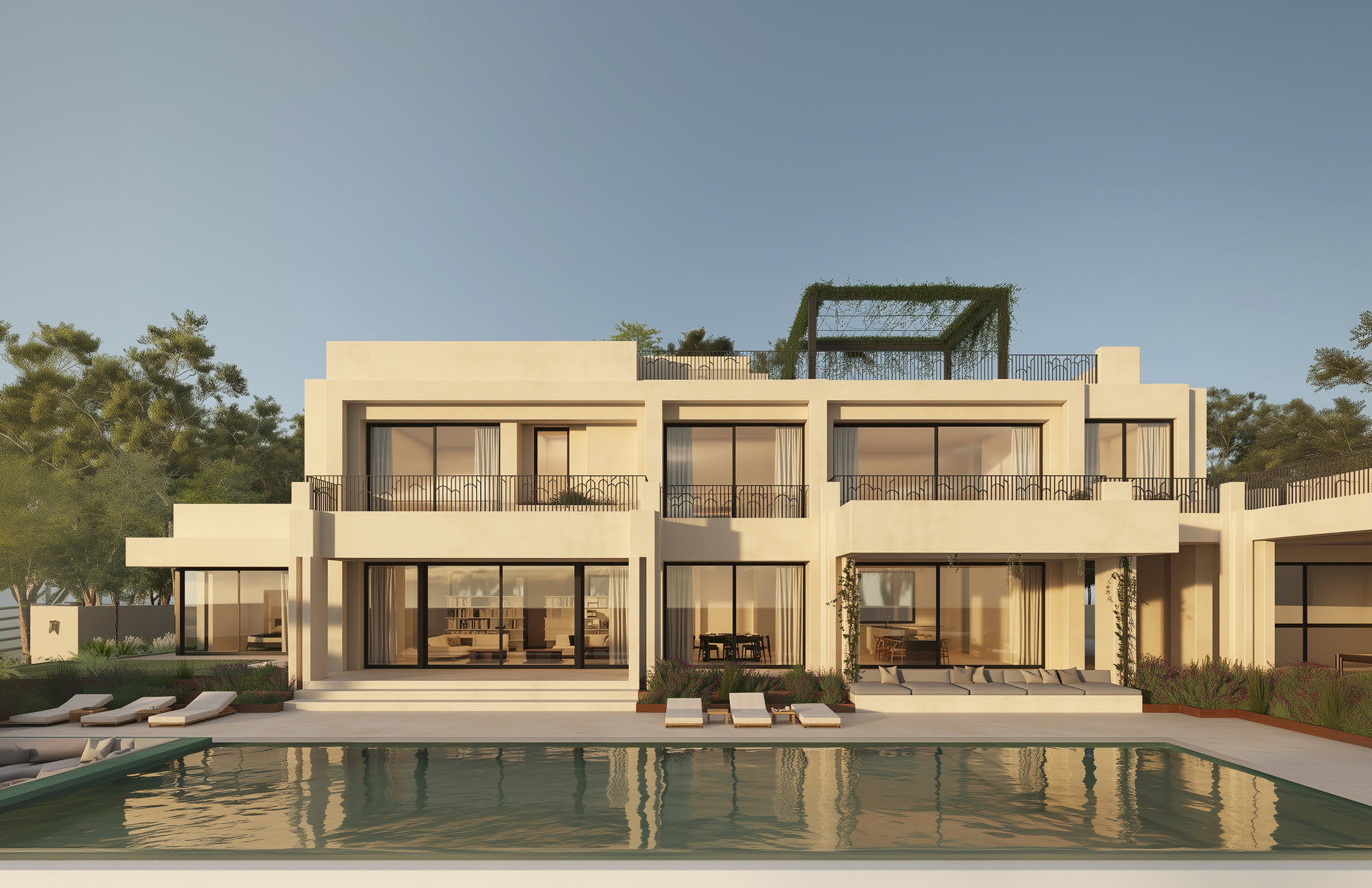 Main entrance of CASASOLA with white pillars and landscaped path