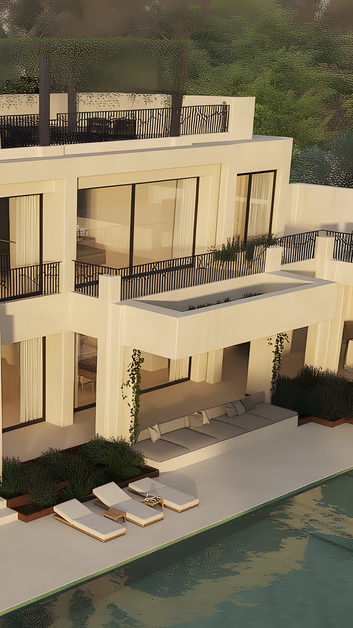 Symmetrical façade of villa with classical lines and tiled roof