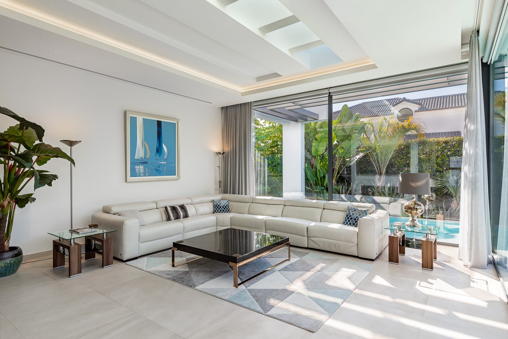 Exterior living room sheltered by structural pergola