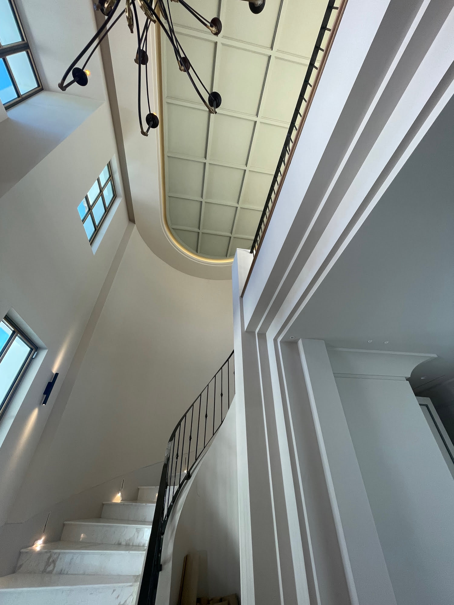 Large windows and symmetrical balconies of the main elevation