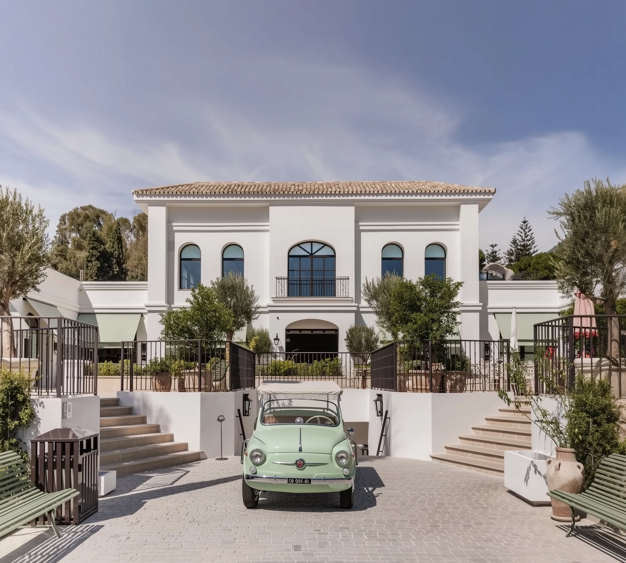 FORUM – front façade with classical arches and luxury signage