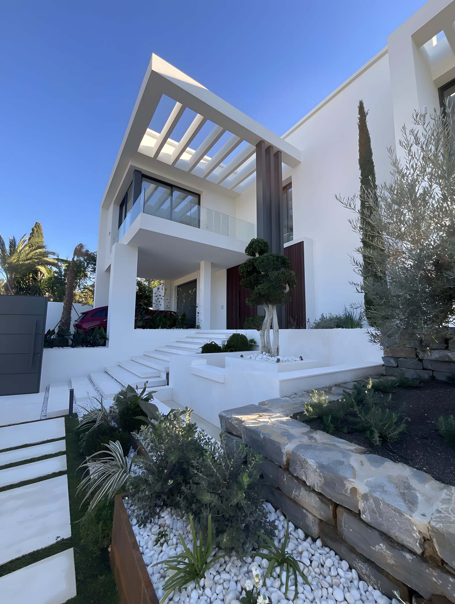 Main facade showing horizontal layers and symmetry