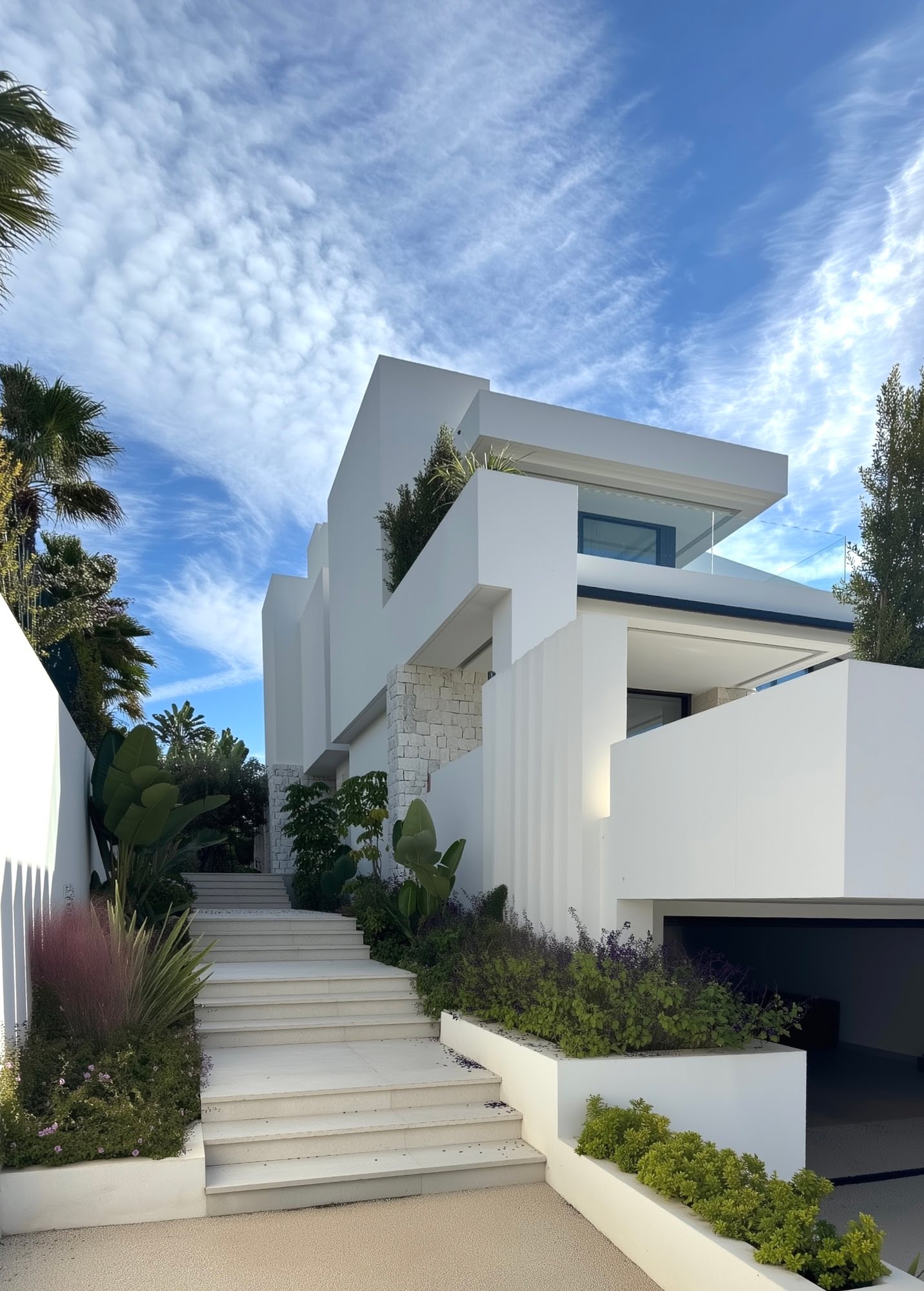 Elegant exterior with soft transitions between floors and glass railings