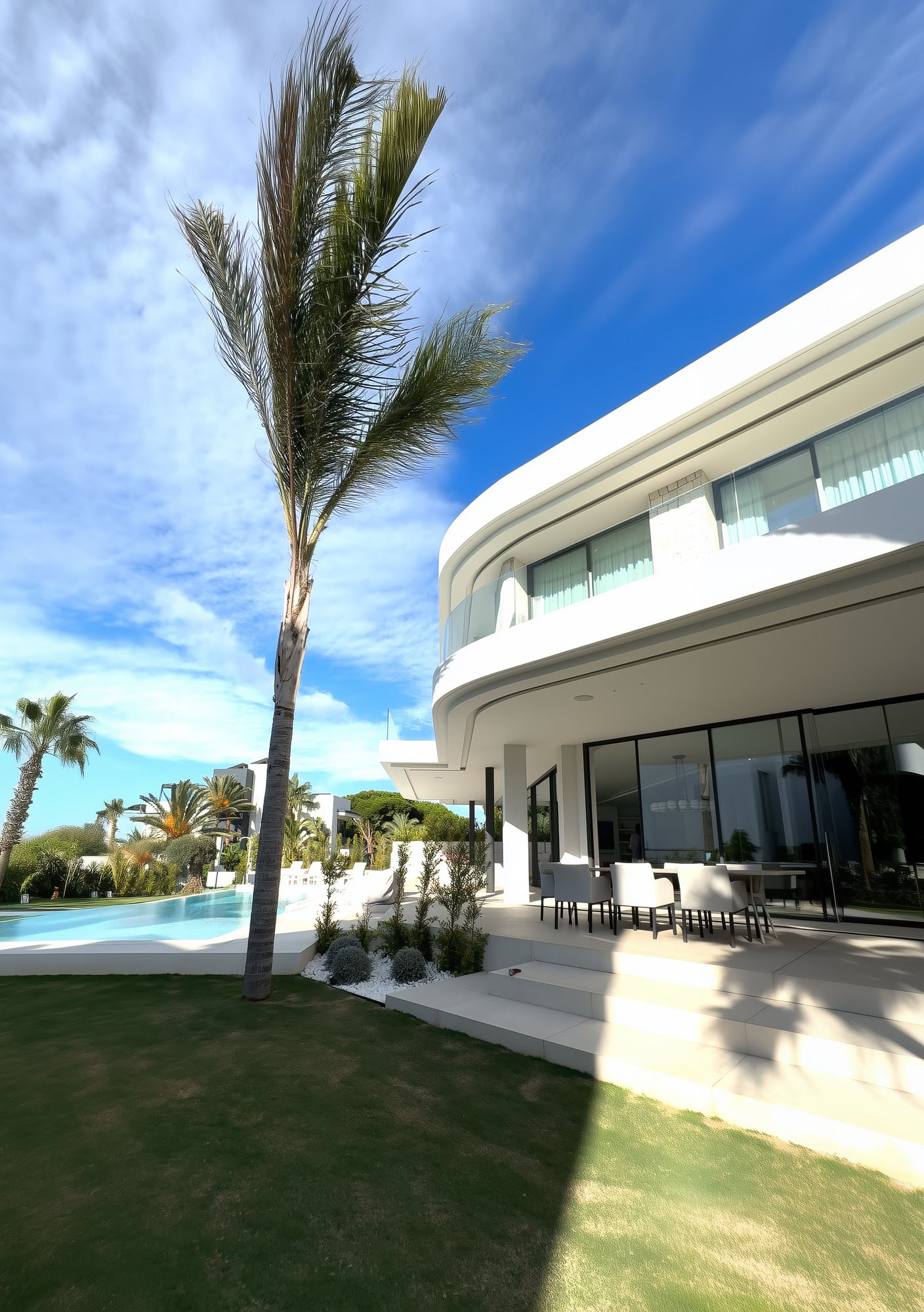 Top floor suite with panoramic window and curved ceiling