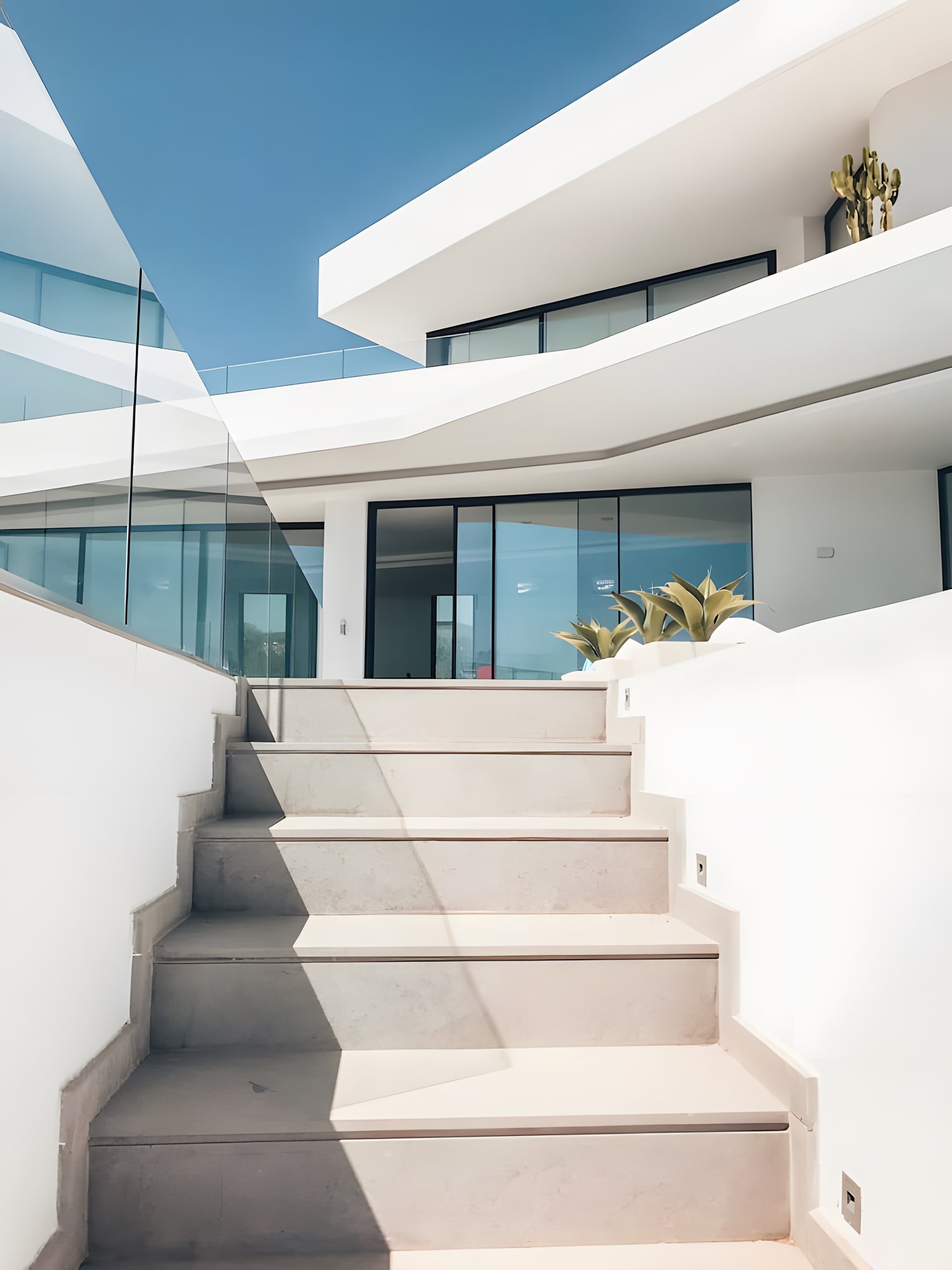 Indoor living area with glass walls and minimalist décor