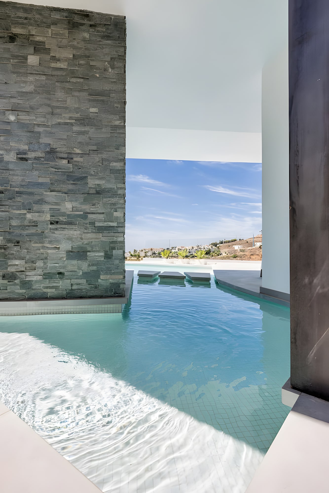 Covered terrace with panoramic valley and sky views