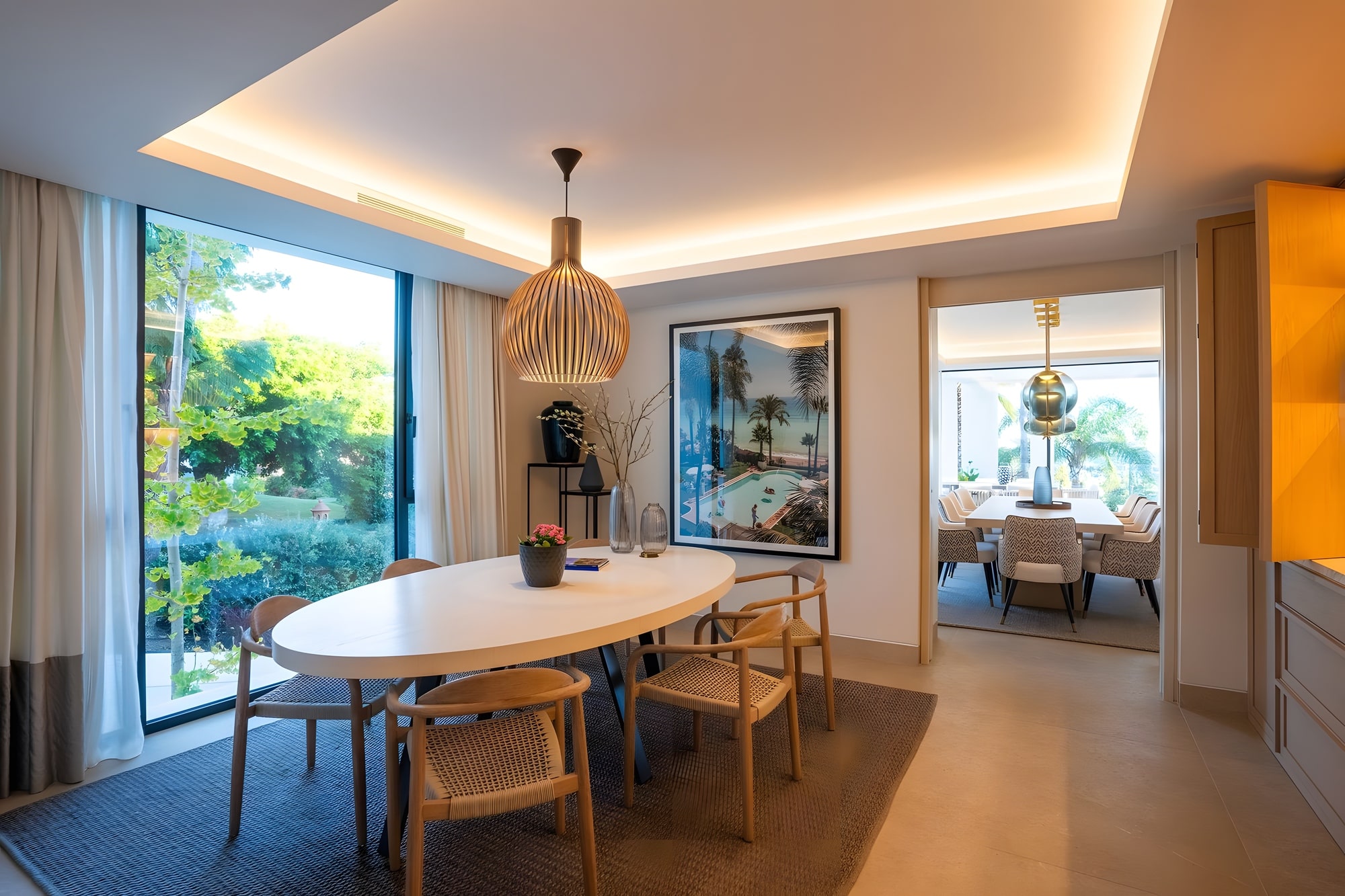 Bedroom suite with direct terrace access and greenery backdrop