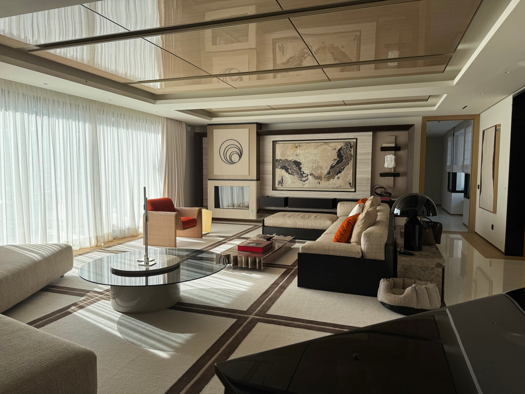 Covered porch with dining table and pool view