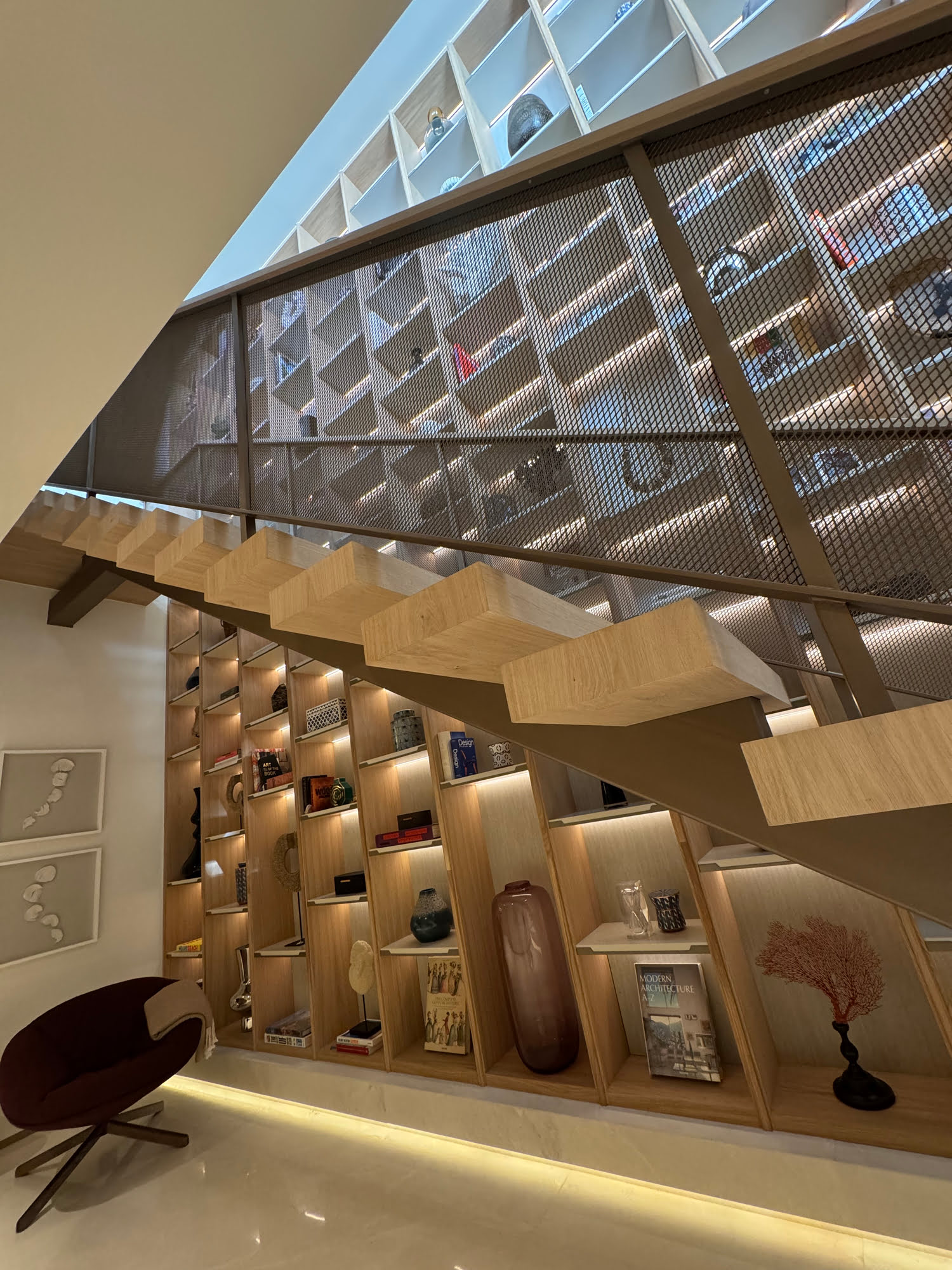 Twilight atmosphere over pool reflecting façade lights