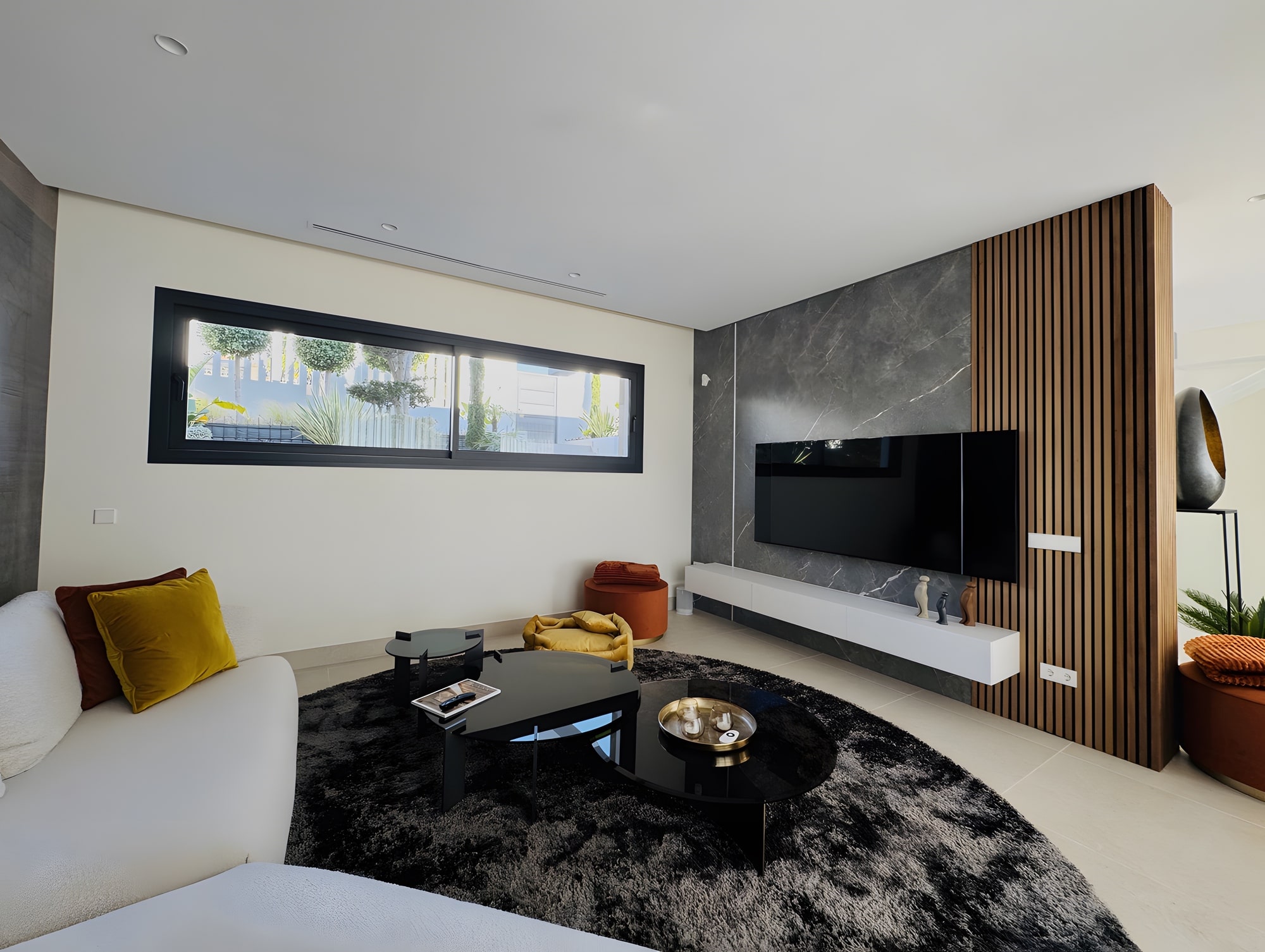 Garden detail showing ornamental grasses and tropical plants