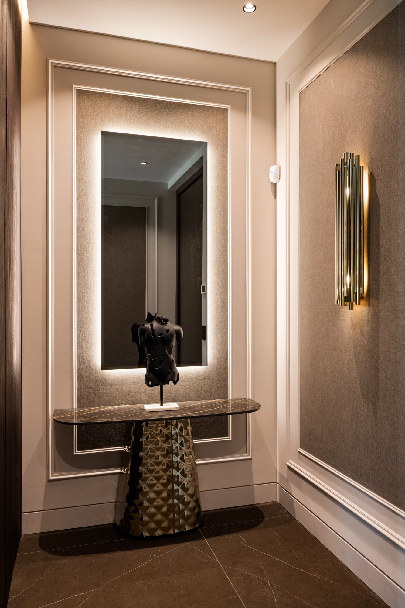 Outdoor lounge and sunbeds in minimalist garden setting