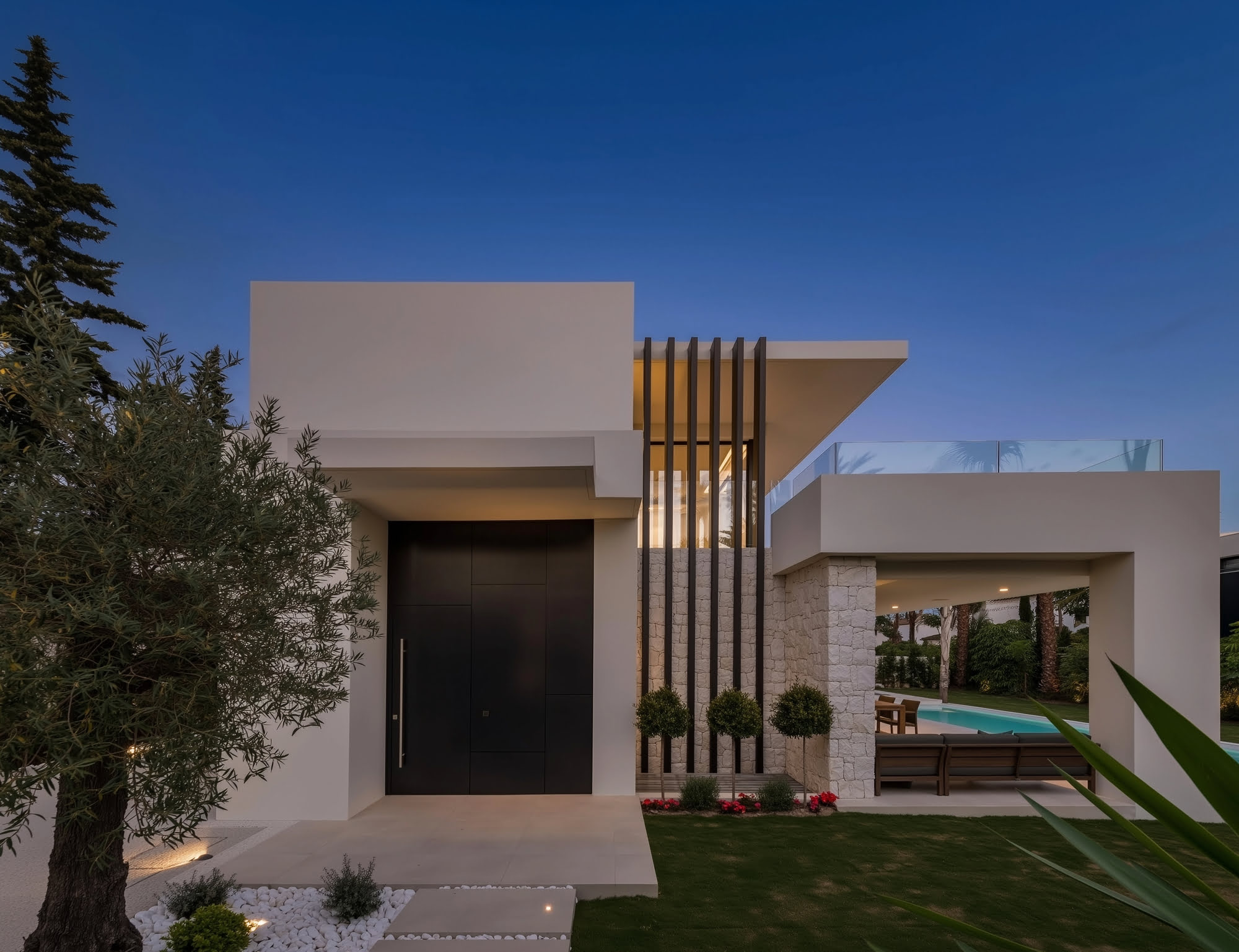 Modern kitchen with marble island and full-height cabinetry
