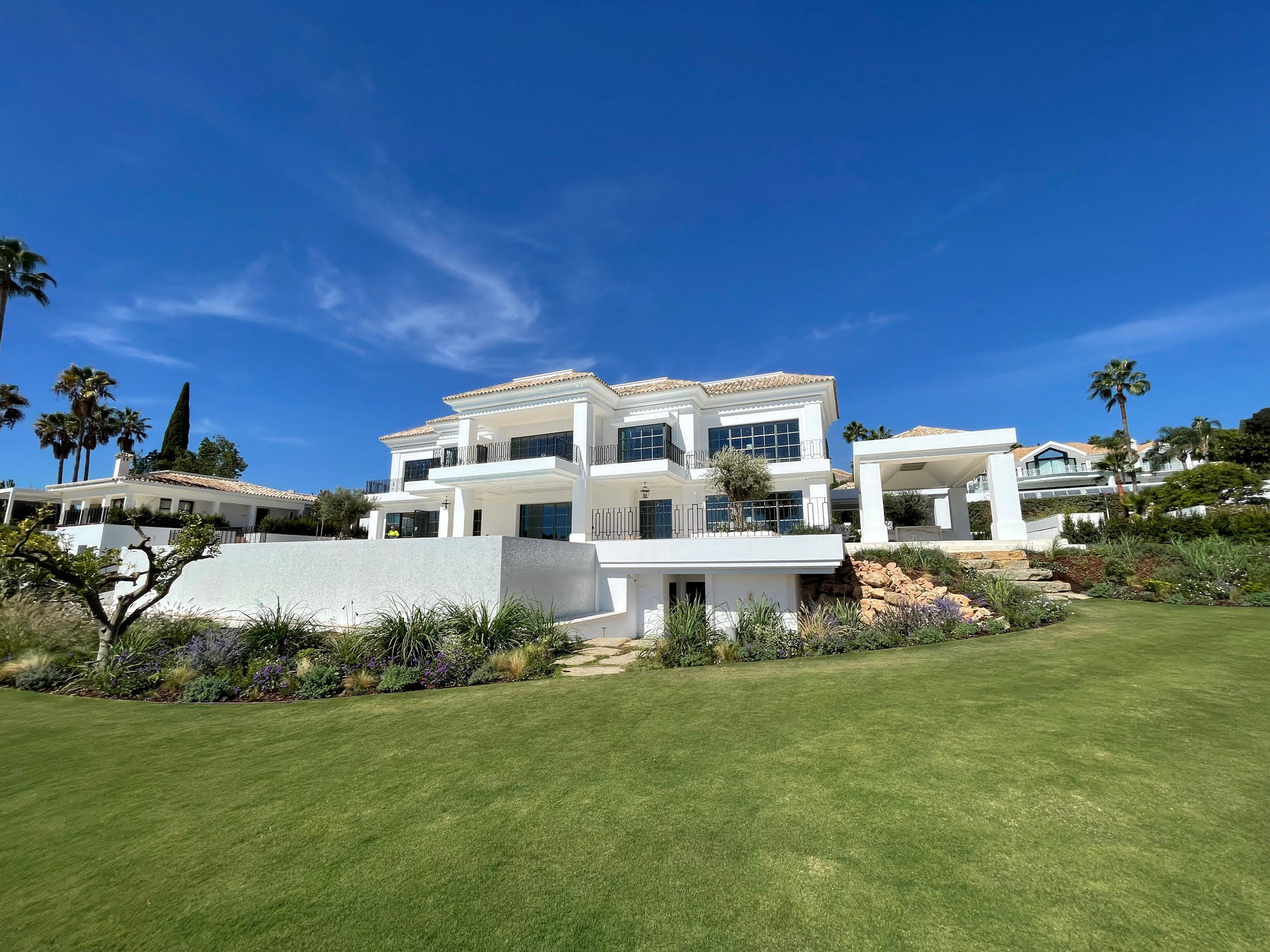 DIVA traditional-style villa inspired by classic Marbella elegance and serene landscaping