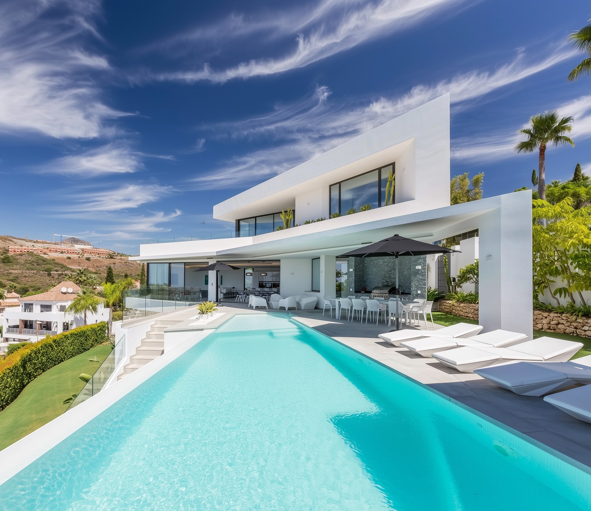 ORIGAMI – angular white villa with expressive folded volumes